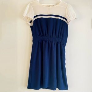 Vintage dress, slightly sheer white chest and sleeve, solid navy body. S.